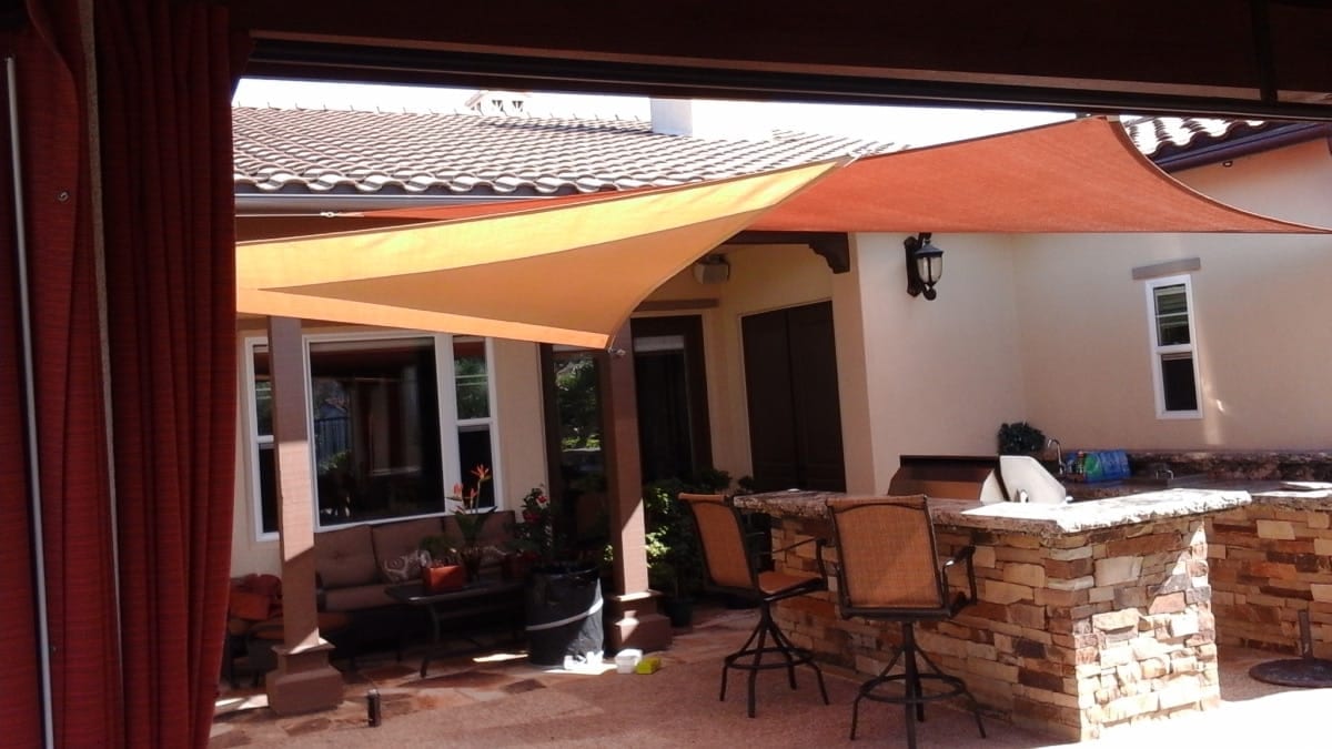 Real Southern California patio and pool with custom shade sails